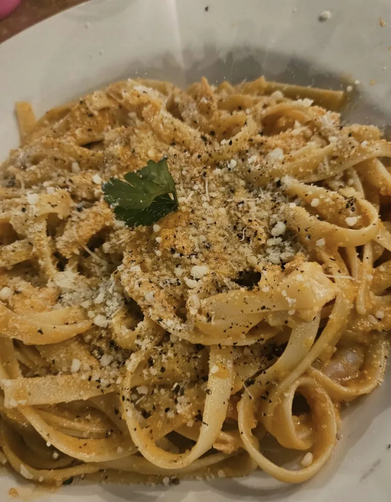 Fresh Italian pasta with tomato and basil